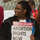 A young woman protests during International Women’s Day Protest in Dublin on March 8, 2014.
iStock